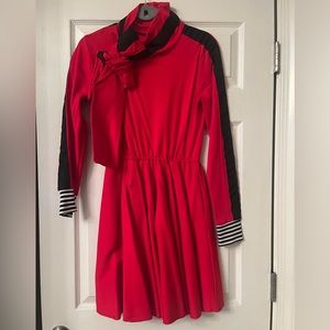 A cute, fun dress with a tied bow around neck